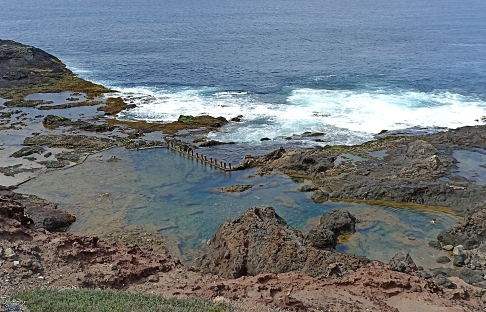 Natural swimming pools at Punta de Gáldar, Gran Canaria photographed from above.